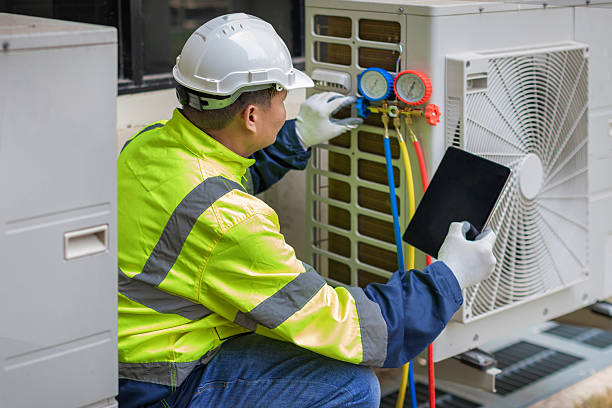 Professional Hvac technician working in Louviers, CO